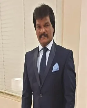 SHRI. DHANRAJ PILLAI